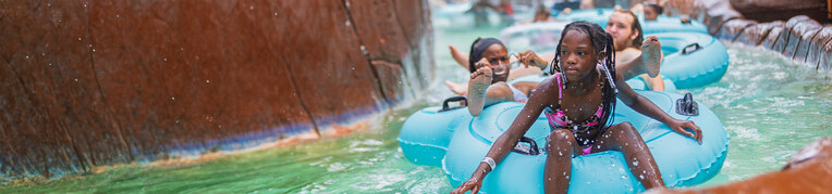 Families enjoying Massanutten Resort Water Park in Virginia with slides and pools