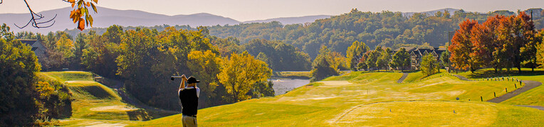 A man playing golf on the Woodstone Meadows Golf Course at Massanuten Resort